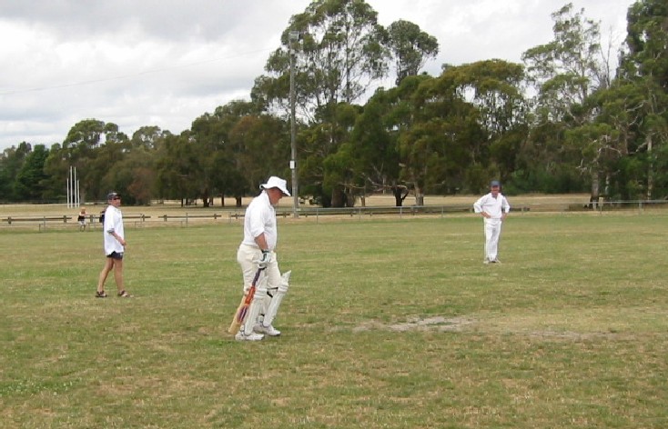 Former England Captain Mike Gatting walks to the crease.