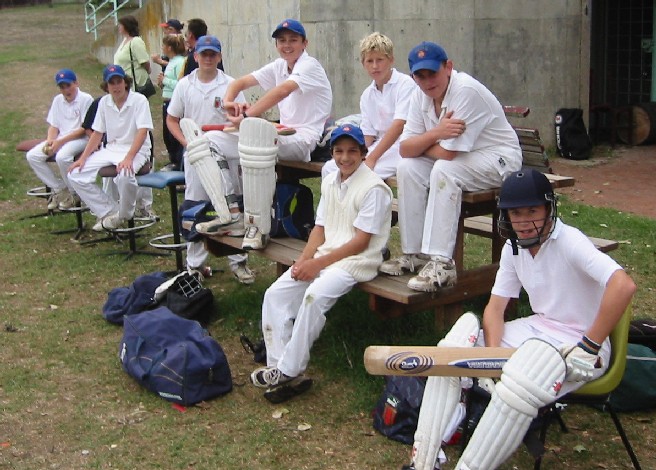 Under 14s waiting to bat.