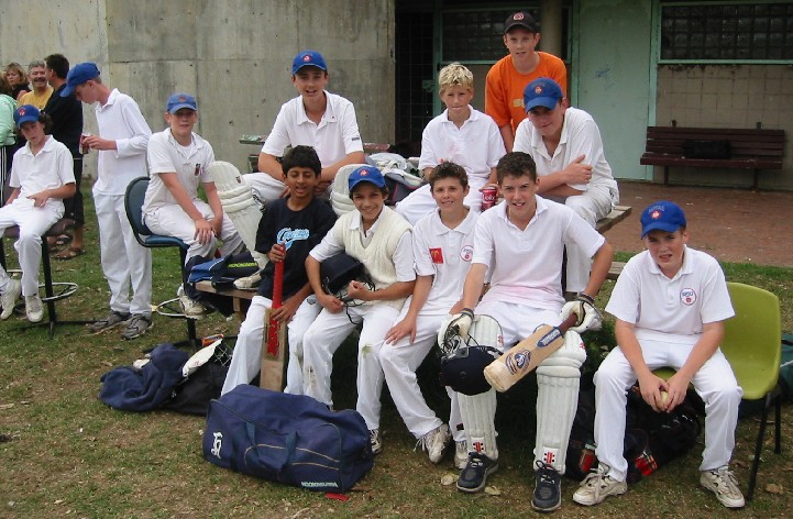 Under 14s waiting to bat.