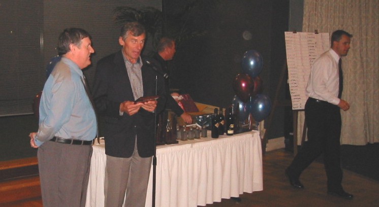 Ralph Kernaghan accepts the Best & Fairest award from Graeme Renshaw.